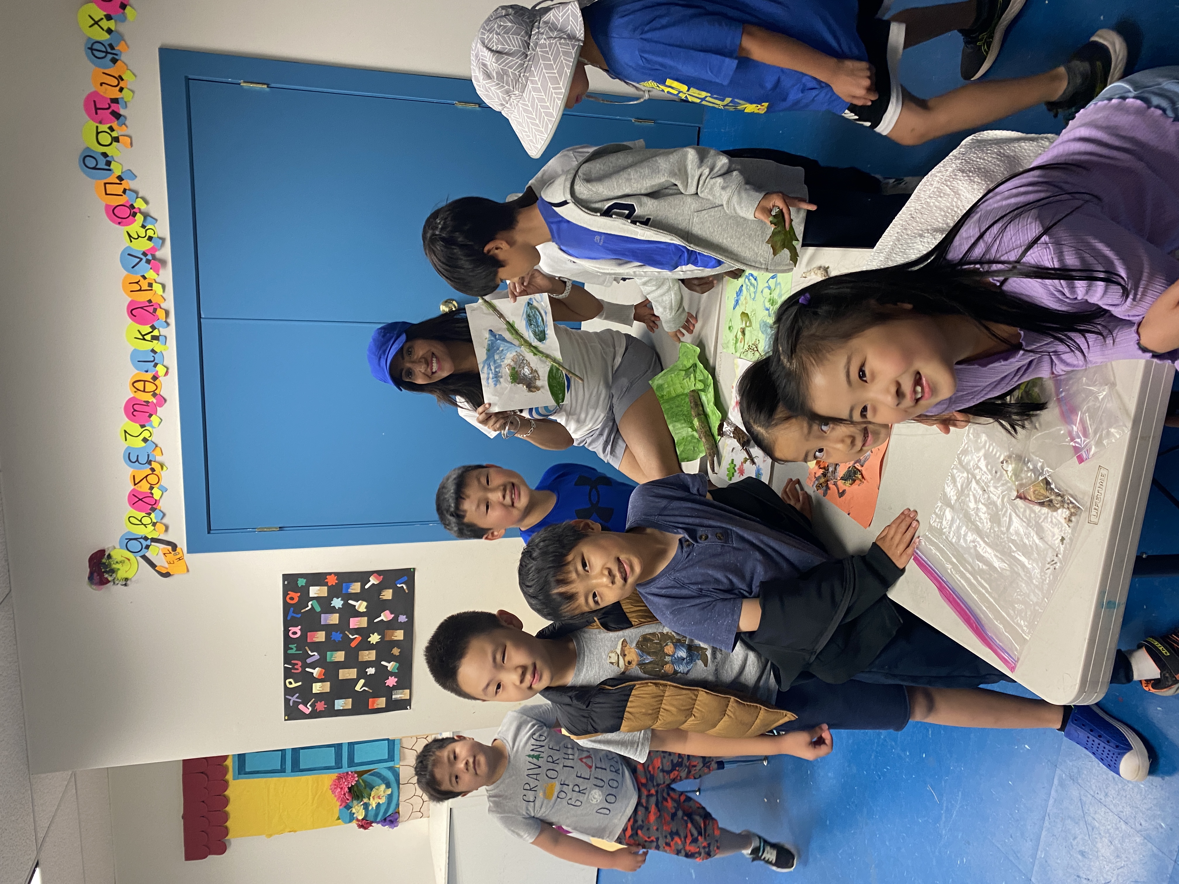 Dr. Shimi Kang teaching kids in a classroom